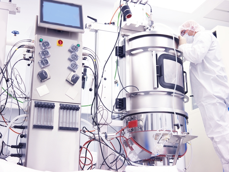 Scientist at a bioreactor